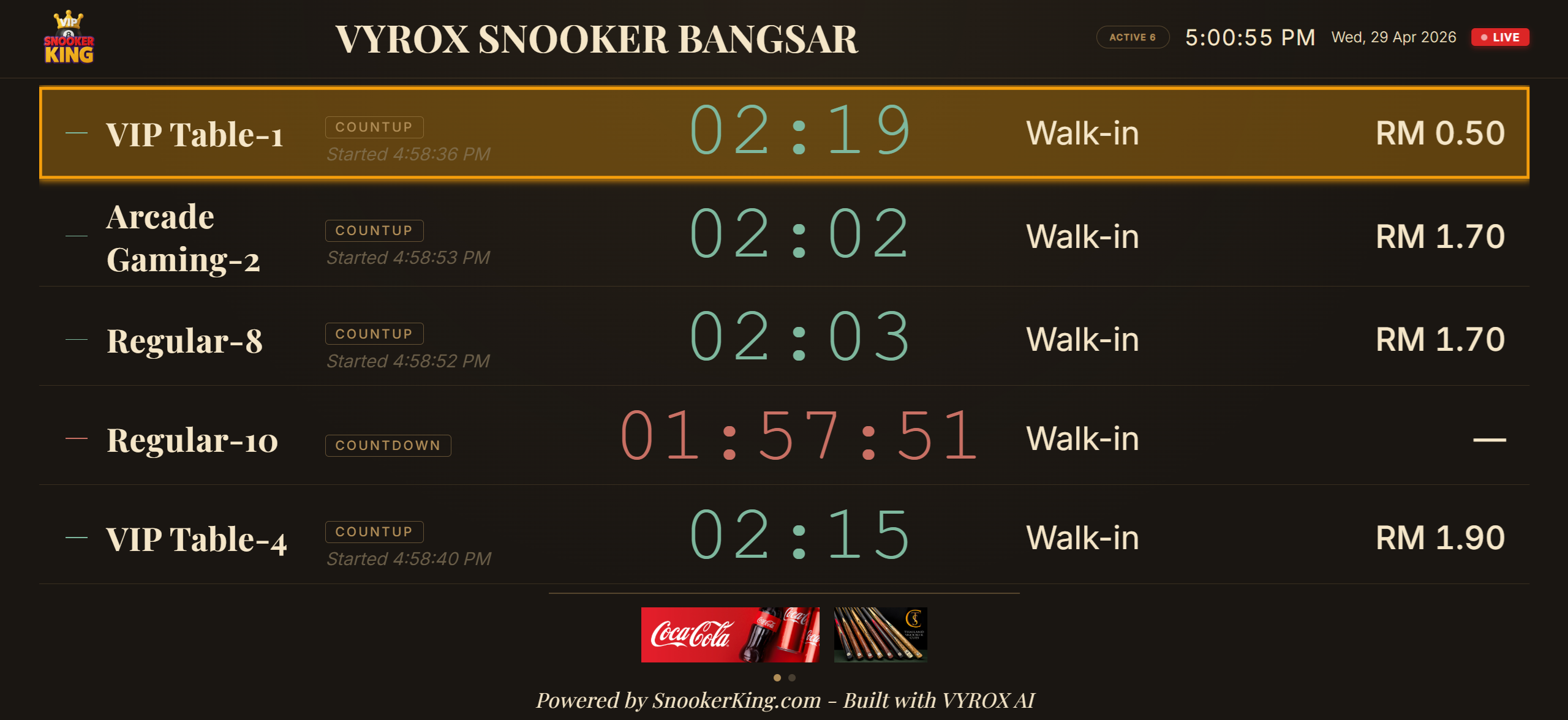 Snooker King lounge TV — members watch their session timer, table tariff, and queue position on a tokenised public board styled to match the club's brand