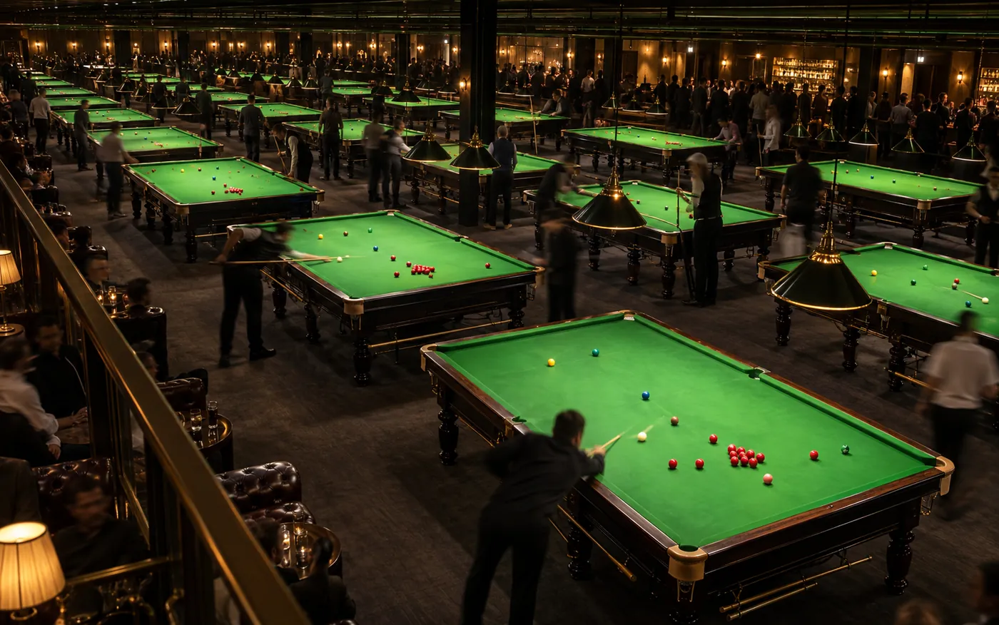 A busy snooker venue with every table in play